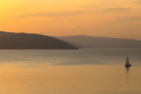 Colorful dramatic sunset at Trondheim fjord in the springの写真素材