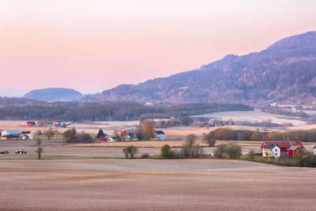 Spring sunset at the agricultural area Byneset located near the city Trondheimの写真素材