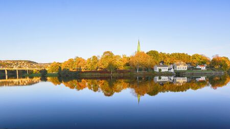 River Nidelva, the bridge over the rver and the cathedral Nidarosdomen in the Norwegian city...