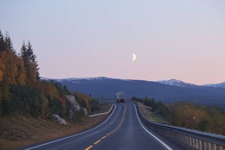 Open road in the mountains over Innerdalen ( Innset ) in Norwayの写真素材