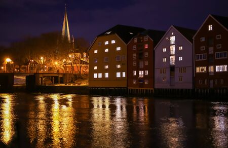 River Nidelva, The Old Bridge, the cathedral Nidarosdomen and historical timber nuildings along the...