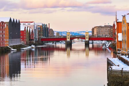 River Nidelva and the bridge Bakke bru in the Norwegian city trondheim in the winterの写真素材