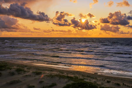 Colorful sunset at the beach Saulkrasti, the popular touristic area in Latviaの写真素材