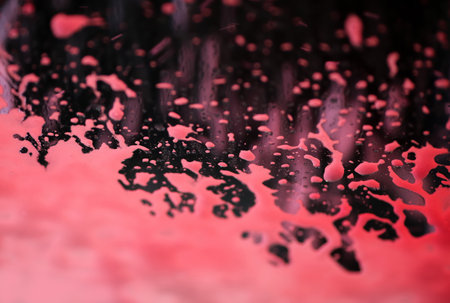 Abstract background of colorful soap foam on the glass while car washingの写真素材