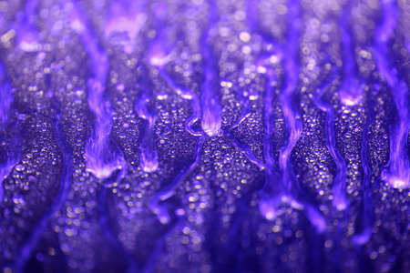 Abstract background of the water drops on the glass while car washingの写真素材
