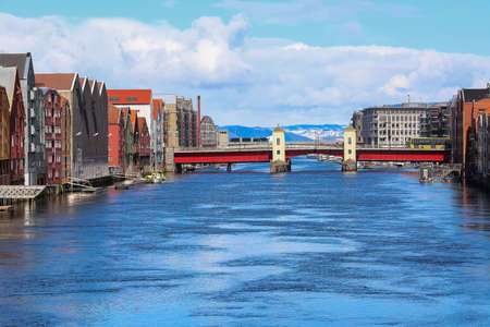 Spring in Trondheim, view of the river Nidelva and the bridge Bakke Bru in historical town