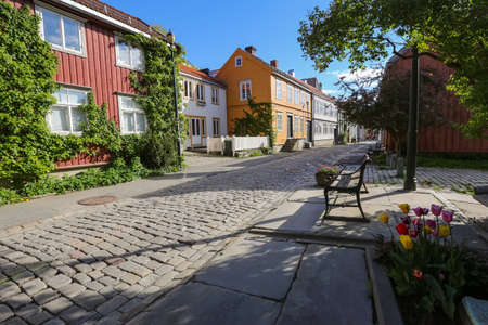 Street in Bakklandet, popular touristic district in the Norwegian city Trondheimの写真素材
