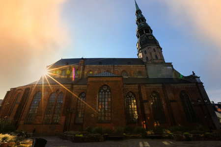 Architectural landmark St. Peter`s  church in the historical old town in Rigaの写真素材