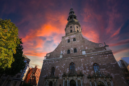 Architectural landmark St. Peter`s  church in the historical old town in Rigaの写真素材