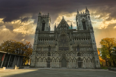 Fall in Trondheim, view of the cathedral Nidarosdomen   during sunsetの写真素材