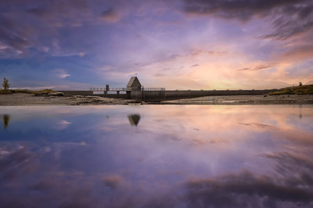Dam at the lake Stor Sverje located in the Kvikne municipality, Norwayの写真素材