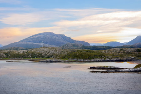 Norwegian sea coast with wind turbine in Troendelag county , Norway. View from the cruise shipの写真素材