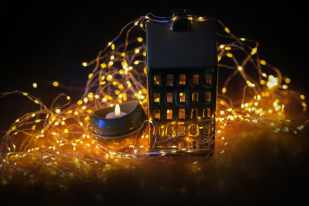 Christmas toys surrounded of Christmas lightの写真素材