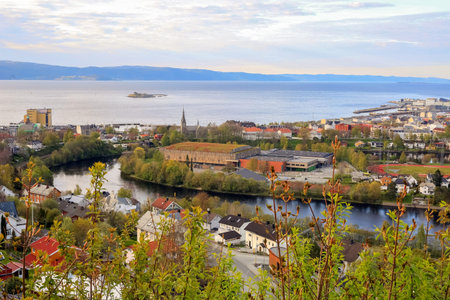 Spring in Trondheim, aerial view of Trondheim fjord, island Munkholmen and the river Nidelva