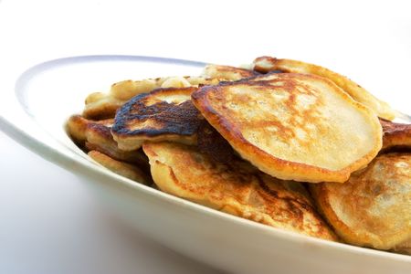Yellow pankakes on a plateの写真素材