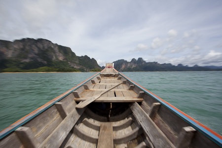 Travel with boat in Ratchaprapa dam lakeside ,Thailandの写真素材