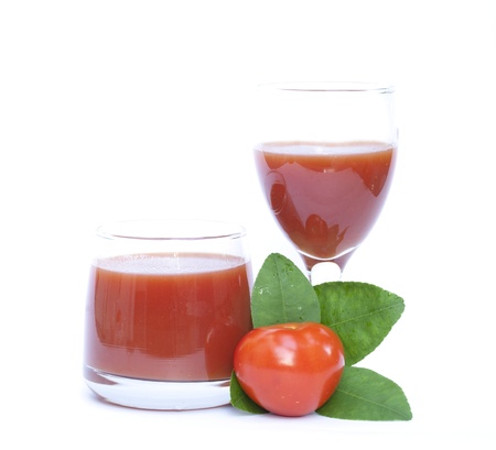 Tomato and juice on the white backgroundの写真素材