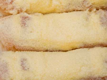Sweet bread with butter and sugar isolated