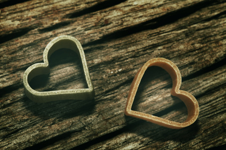 Two heart on old wood backgroundの写真素材