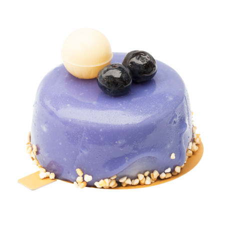 Blueberry cake with white chocolate on topの写真素材