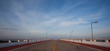 Bridge with bicycle lane and blue skyの写真素材