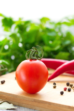 Tomatoes and spicesの写真素材