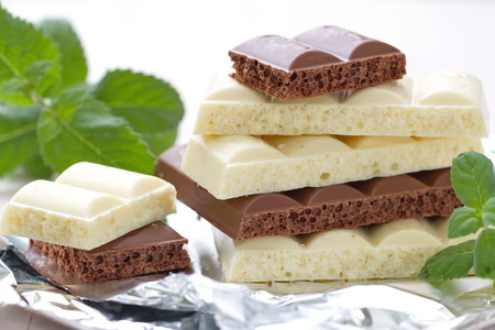 Slices of dark and white chocolate
