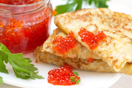 Pancakes with red caviarの写真素材