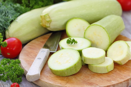 Fresh vegetable marrow and other vegetables for cookingの写真素材