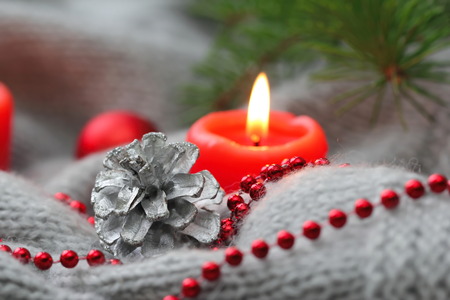 Christmas card with cone, candle and christmas decorationの写真素材