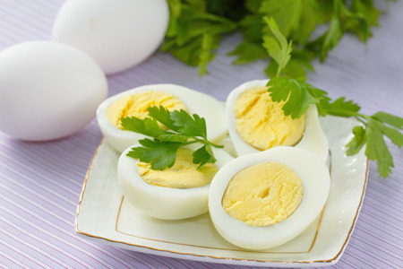 Boiled eggs on the plateの写真素材