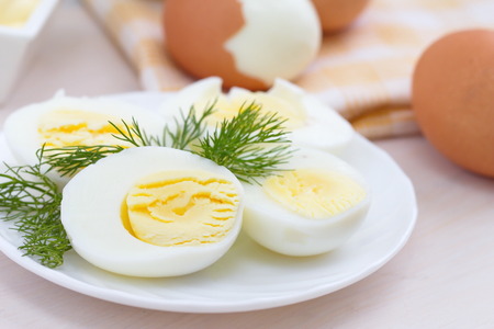 Boiled eggs with fennel on the plate