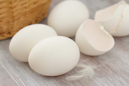 White chicken eggs on the table