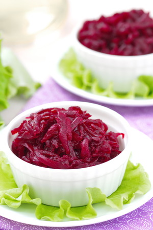 Beet salad in a white bowlの写真素材
