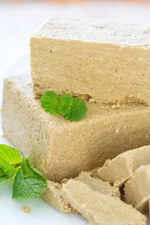 Sliced sunflower halva on the tableの写真素材