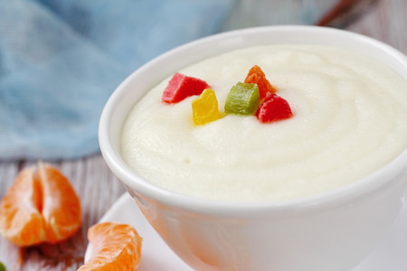 Healthy breakfast. Semolina with candied fruitの写真素材