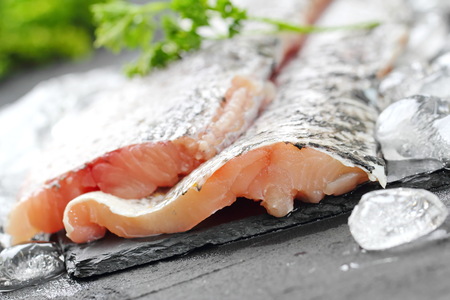Raw fish on the table prepared for cooking