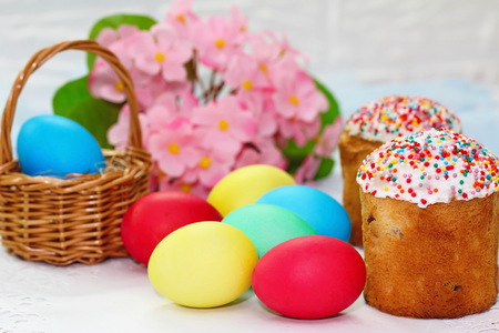 Easter cake and colored eggs for holiday