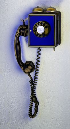 Blue Antique Wall phone with clapper-bells, rotary dial の写真素材