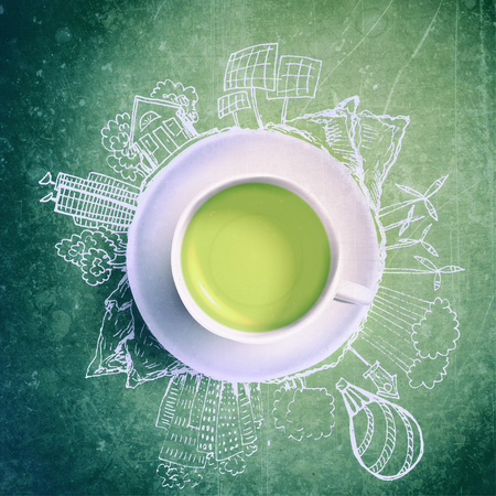 Green tea with circle ecology doodles. Sketched eco elements with cup of green teaの写真素材