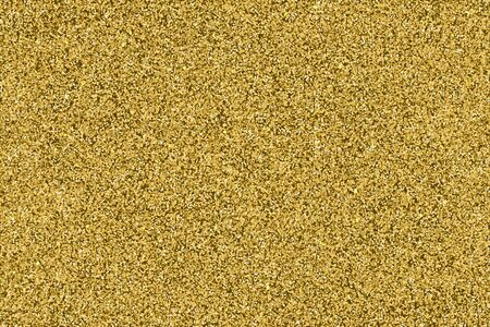 Vector realistic gold glitter particles effect - isolated shiny confetti and glitter sparkling texture. Star dust sparks in explosion on transparent background.のイラスト素材
