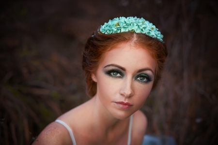 Red-haired girl with freckles of the bride dressの写真素材