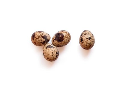 Quail eggs on whiteの写真素材