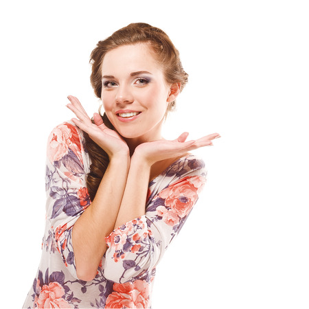 Young happy woman in the colored dressの写真素材