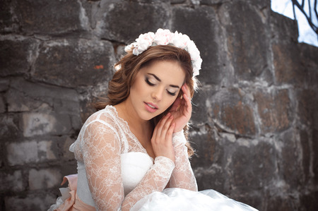 Beautiful bride outdoors. Castle. Wedding day.の写真素材