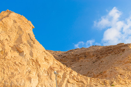 Where sand and mountain meet in Fujairah, UAE.の写真素材