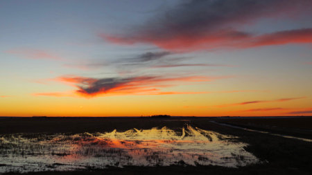 Reflecting Saskatchewan prairie sunsetの写真素材