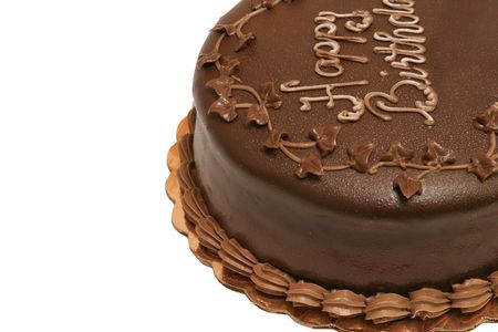A top view of a chocolate birthday cake, with the words "Happy Birthday" clearly written on it.の写真素材