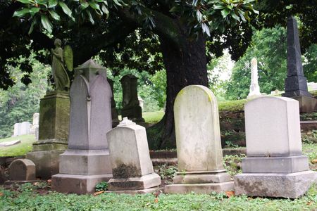 a row of blank tombstones in historic cave hill cemetaryの写真素材