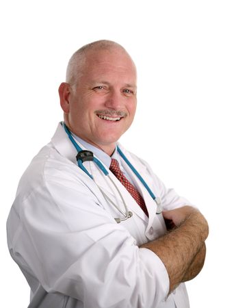 A friendly, compassionate doctor smiling against a white background.の写真素材